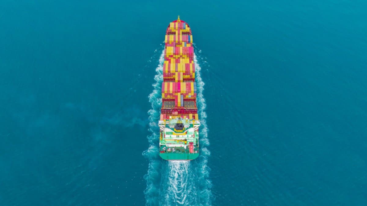 Aerial view of a large cargo ship navigating the ocean